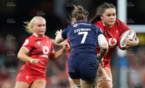 110426 - Wales v Scotland, Guinness Women’s 6 Nations - Jorja Aiono of Wales takes on Alex Stewart of Scotland  as Seren Singleton of Wales supports