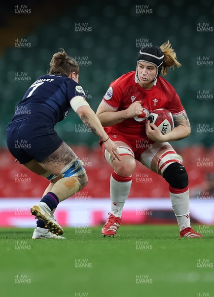 110426 - Wales v Scotland, Guinness Women’s 6 Nations - Bethan Lewis of Wales takes on Alex Stewart of Scotland 
