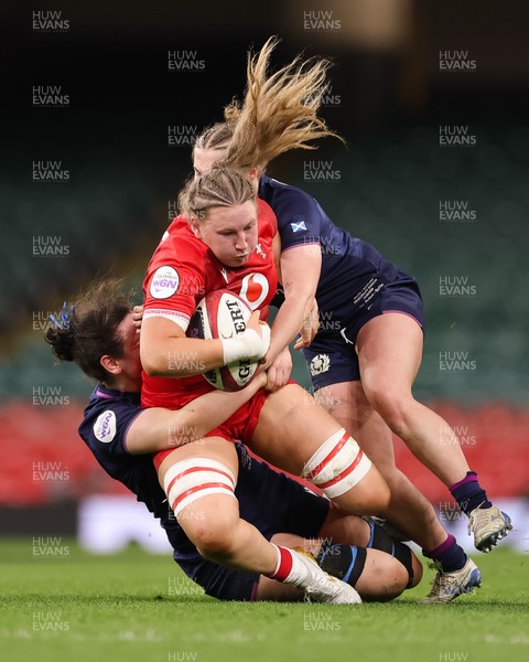 110426 - Wales v Scotland, Guinness Women’s 6 Nations - Alaw Pyrs of Wales takes on Holland Bogan of Scotland and Leia Brebner-Holden of Scotland 