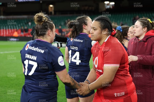 110426 - Wales v Scotland, Guinness Women’s 6 Nations - Sisilia Tuipulotu of Wales with Demi Swann of Scotland at the end of the match