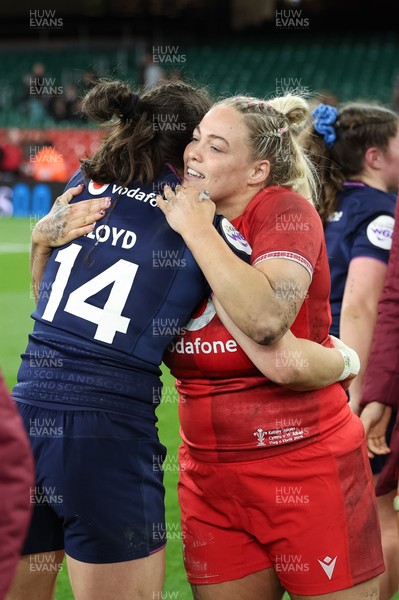 110426 - Wales v Scotland, Guinness Women’s 6 Nations - Kelsey Jones of Wales with Rhona Lloyd of Scotland at the end of the match