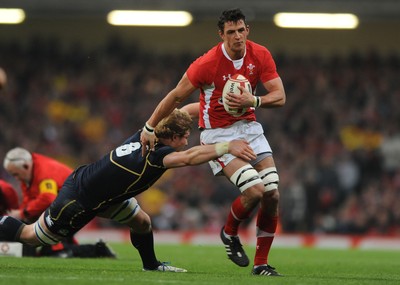 120212 - Wales v Scotland - RBS Six Nations 2012 -Aaron Shingler of Wales is tackled by David Denton of Scotland