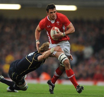 120212 - Wales v Scotland - RBS Six Nations 2012 -Aaron Shingler of Wales is tackled by David Denton of Scotland