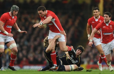 120212 - Wales v Scotland - RBS Six Nations 2012 -George North of Wales is tackled by Richie Gray of Scotland