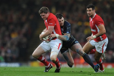 120212 - Wales v Scotland - RBS Six Nations 2012 -Rhys Priestland of Wales is tackled by Sean Lamont of Scotland