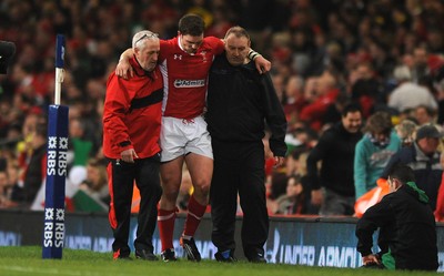 120212 - Wales v Scotland - RBS Six Nations 2012 -George North of Wales leaves the field with an injury