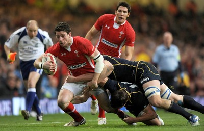 120212 - Wales v Scotland - RBS Six Nations 2012-Alex Cuthbert of Wales is stopped