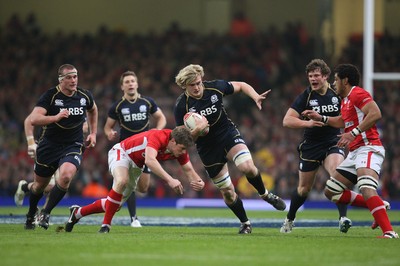 120212 - Wales v Scotland, RBS 6 Nations 2012 -Scotland's Richie Gray takes on Wales' Rhys Priestland and Wales' Toby Faletau 