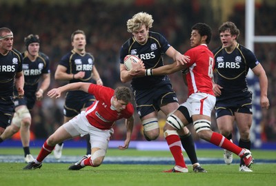 120212 - Wales v Scotland, RBS 6 Nations 2012 -Scotland's Richie Gray takes on Wales' Rhys Priestland and Wales' Toby Faletau 