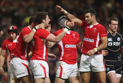 120212 - Wales v Scotland, RBS 6 Nations 2012 -Wales' Alex Cuthbert celebrates with Wales' Mike Phillips after scoring try