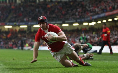 120212 - Wales v Scotland, RBS 6 Nations 2012 -Wales' Leigh Halfpenny races in to score his second try