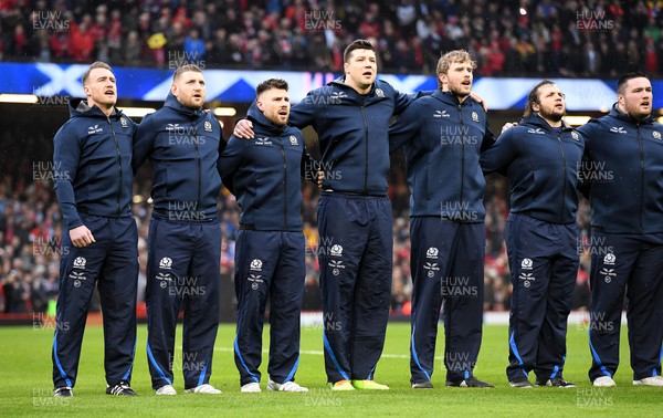 120222 - Wales v Scotland - Guinness Six Nations - Stuart Hogg, Finn Russell, Ali Price, Grant Gilchrist, Jonny Gray, Pierre Schoeman during the anthems