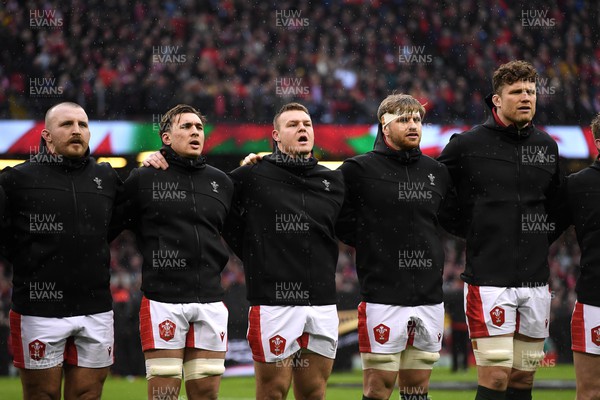 120222 - Wales v Scotland - Guinness Six Nations - Dillon Lewis, Taine Basham, Dewi Lake, Aaron Wainwright and Will Rowlands during the anthems