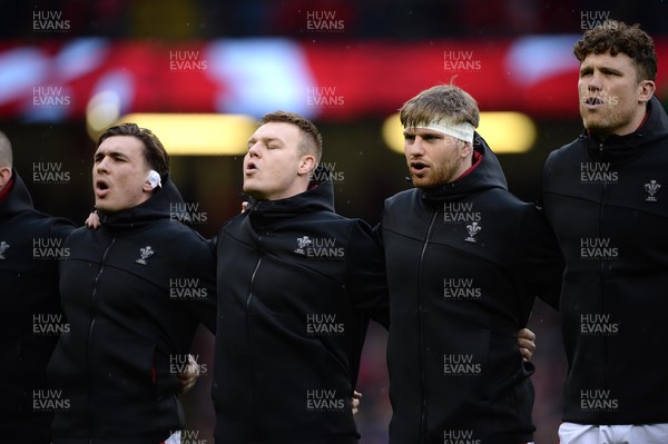 120222 - Wales v Scotland - Guinness Six Nations - Taine Basham, Dewi Lake, Aaron Wainwright and Will Rowlands of Wales durng the anthems