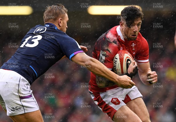 120222 - Wales v Scotland - Guinness Six Nations - Alex Cuthbert of Wales is tackled by Chris Harris of Scotland