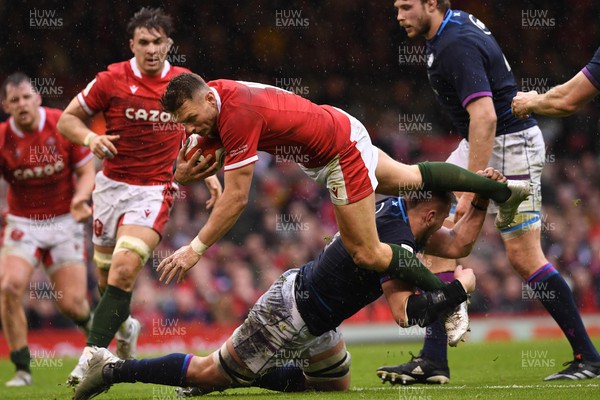 120222 - Wales v Scotland - Guinness Six Nations - Dan Biggar of Wales is tackled by Matt Fagerson of Scotland