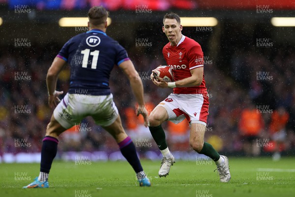 120222 - Wales v Scotland - Guinness Six Nations Championship - Liam Williams of Wales is challenged by Duhan van der Merwe of Scotland