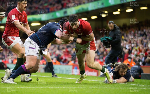 120222 - Wales v Scotland 2022 Guinness Six Nations - Alex Cuthbert of Wales powers over the line but the try is not awarded
