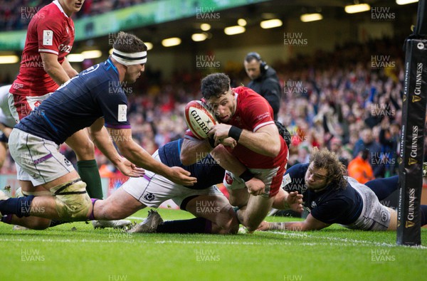 120222 - Wales v Scotland 2022 Guinness Six Nations - Alex Cuthbert of Wales powers over the line but the try is not awarded