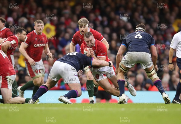 120222 - Wales v Scotland 2022 Guinness Six Nations - Dewi Lake of Wales takes on Zander Fagerson of Scotland