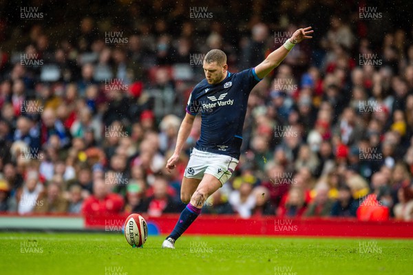 120222 - Wales v Scotland - Guinness Six Nations - Finn Russell of Scotland kicks for goal