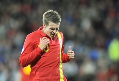 121012 - Wales v Scotland - FIFA 2014 World Cup Qualifying Campaign - Aaron Ramsey of Wales reacts after missing a chance to score 