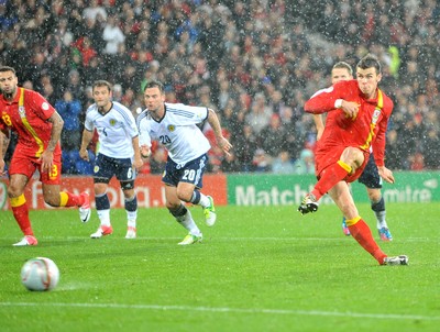 121012 - Wales v Scotland - FIFA 2014 World Cup Qualifying Campaign - Gareth Bale of Wales scores from the penalty spot 