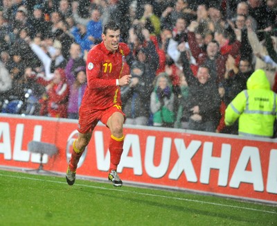 121012 - Wales v Scotland - FIFA 2014 World Cup Qualifying Campaign - Gareth Bale of Wales celebrates scoring the winner 
