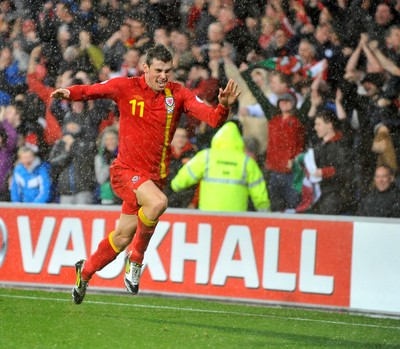 121012 - Wales v Scotland - FIFA 2014 World Cup Qualifying Campaign - Gareth Bale of Wales celebrates scoring the winner 