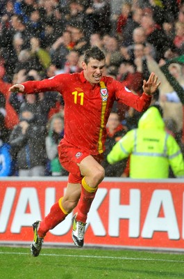 121012 - Wales v Scotland - FIFA 2014 World Cup Qualifying Campaign - Gareth Bale of Wales celebrates scoring the winner 