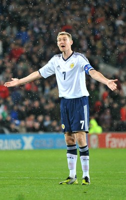 121012 - Wales v Scotland - FIFA 2014 World Cup Qualifying Campaign - Darren Fletcher of Scotland reacts after Wales score 