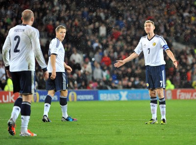 121012 - Wales v Scotland - FIFA 2014 World Cup Qualifying Campaign - Darren Fletcher of Scotland reacts at Alan Hutton after Wales score  