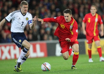 121012 - Wales v Scotland,  FIFA 2014 World Cup Qualifier -Wales' Aaron Ramsey takes on Scotland's Darren Fletcher