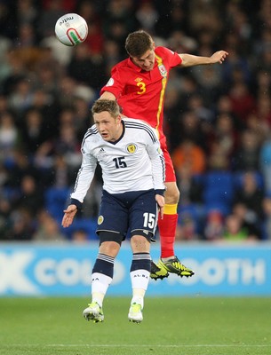 121012 - Wales v Scotland,  FIFA 2014 World Cup Qualifier -Scotland's Kris Commons and Wales' Ben Davies compete for the ball