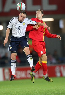 121012 - Wales v Scotland,  FIFA 2014 World Cup Qualifier -Scotland's Scott Brown and Wales' Aaron Ramsey compete for the ball