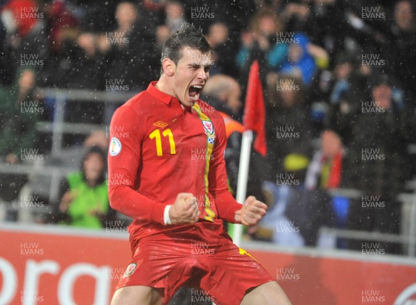 121012 - Wales v Scotland - FIFA 2014 World Cup Qualifying Campaign - Gareth Bale of Wales celebrates scoring the winner 