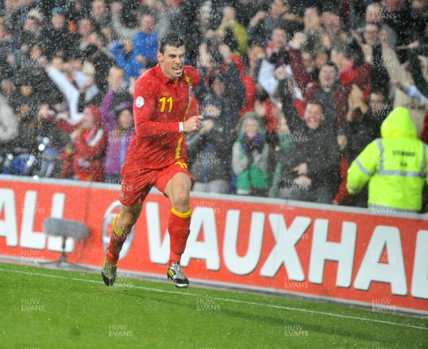 121012 - Wales v Scotland - FIFA 2014 World Cup Qualifying Campaign - Gareth Bale of Wales celebrates scoring the winner 