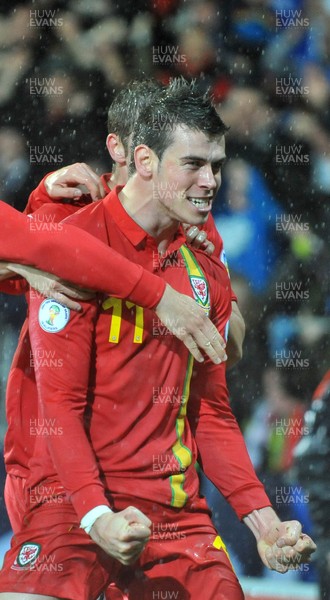 121012 - Wales v Scotland - FIFA 2014 World Cup Qualifying Campaign - Gareth Bale of Wales celebrates scoring the winner 