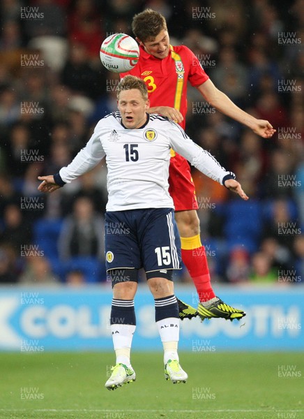 121012 - Wales v Scotland,  FIFA 2014 World Cup Qualifier -Scotland's Kris Commons and Wales' Ben Davies compete for the ball