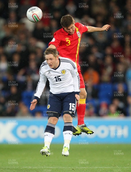 121012 - Wales v Scotland,  FIFA 2014 World Cup Qualifier -Scotland's Kris Commons and Wales' Ben Davies compete for the ball