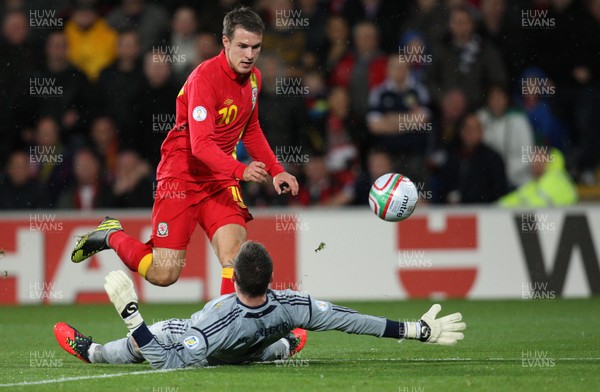 121012 - Wales v Scotland,  FIFA 2014 World Cup Qualifier -Wales' Aaron Ramsey fails to find the net after putting the ball past Scotland's Allan McGregor