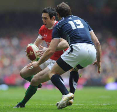 13.02.10 - Wales v Scotland - RBS Six Nations 2010 - Stephen Jones of Wales takes on Sean Lamont of Scotland. 