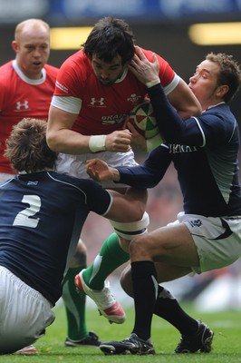 13.02.10 - Wales v Scotland - RBS Six Nations 2010 - Jonathan Thomas of Wales is tackled by Ross Ford and Dan Parks of Scotland. 