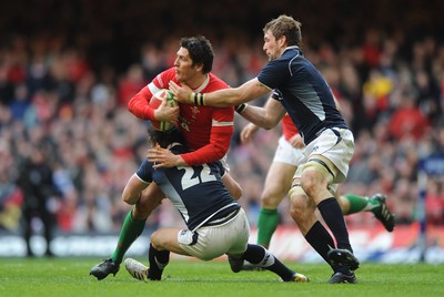13.02.10 - Wales v Scotland - RBS Six Nations 2010 - James Hook of Wales is tackled by Max Evans of Scotland. 