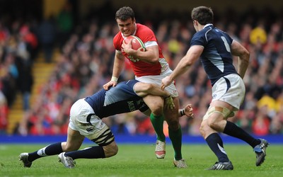 13.02.10 - Wales v Scotland - RBS Six Nations 2010 - Jamie Roberts of Wales holds off Graeme Morrison of Scotland. 