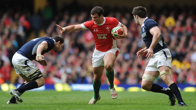 13.02.10 - Wales v Scotland - RBS Six Nations 2010 - Jamie Roberts of Wales holds off Graeme Morrison of Scotland. 