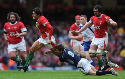 13.02.10 - Wales v Scotland - RBS Six Nations 2010 - James Hook of Wales tries to get past Chris Cusiter of Scotland. 