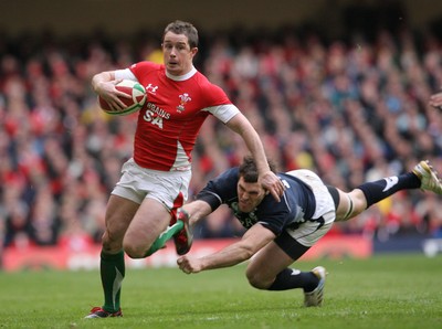 13.02.10 Wales v Scotland... Shane Williams beats Sean Lamont. .
