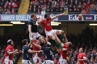 13.02.10 Wales v Scotland... Wales' Jonathan Thomas beats Scotland's Alastair Kellock to lineout ball. 
