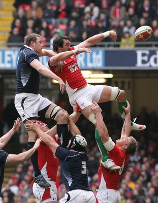 13.02.10 Wales v Scotland... Wales' Jonathan Thomas beats Scotland's Alastair Kellock to lineout ball. 